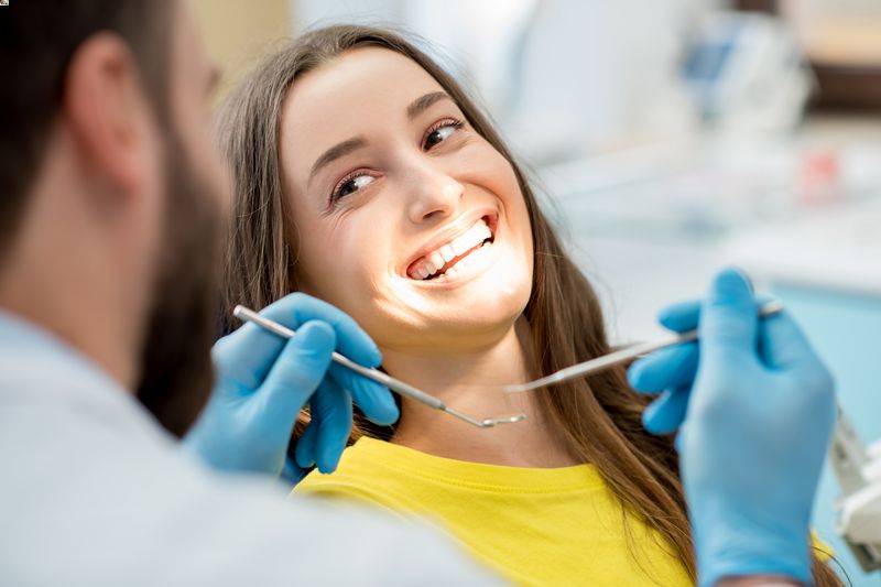 Woman getting a dentistry exam